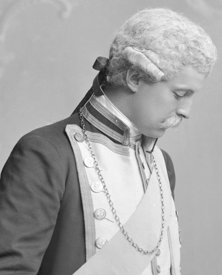 Richard George Penn Curzon-Howe, Viscount Curzon, later 4th Earl Howe (1861-1929); Conservative MP, 1885-1900; Treasurer of the Household, 1896-1900; Lord Chamberlain to Queen Alexandra, 1903-1925. Isabella, Countess Howe (d 1922), n&eacute;e Isabella Maria Katherine Anson; eldest daughter of Major-General Hon George Anson; m&nbsp;(1858) 3rd Earl Howe.