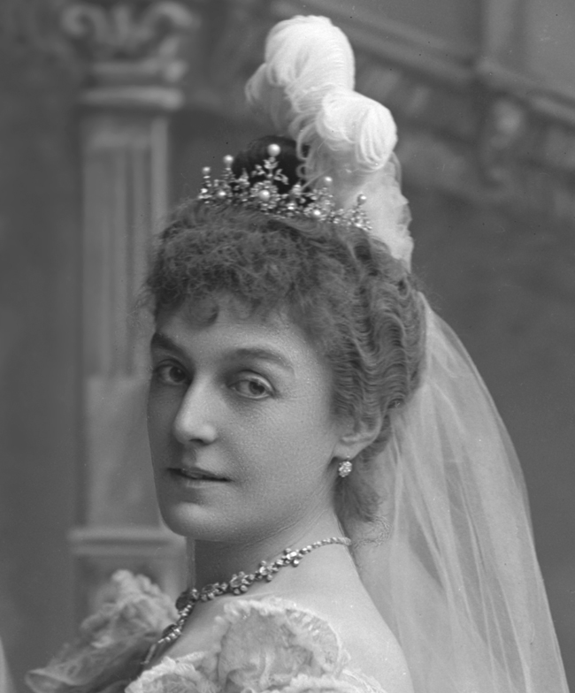 Lady Howard de Walden, later Lady Ludlow, née Blanche Holden (1856-1911); daughter of William Holden of Palace House, Co. Lancaster; m (1876) Frederick George Ellis, 7th Baron Howard de Walden (1830-1899), separated 1893; m (1903) Henry Lopes, 2nd Baron Ludlow (1865-1922).