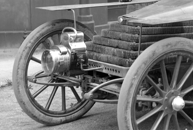 Lieutenant-Commander Montague Grahame-White (1877-1961), racing driver, car, yacht & aeroplane broker, at the wheel of a [4-cylinder, 30 h.p. or 45 h.p.] Wolseley racing car with actor Julius Knight (1863-1941).