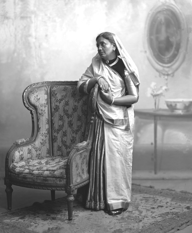 Maharani Bai Shri Nand Kunverbaji Sahiba, CI (2.8.1892). (b. at Dharampur, 1867; d. at Bombay, 9th March 1936), Rcvd. Coronation (1911) and Silver Jubilee (1935) Medals, second daughter of H.H. Maharana Shri Narayandevji Ramdevji Rana Sahib, Raja of Dharampur, by his second wife, H.H. Chhasatia Rani Bai Shri Gulab Kunverba, daughter of Sardar Bhagubava Sahib of Dharampur; married 3 June 1881 HH Thakor Saheb Sir Bhagwatsinghji Sagramji, Thakor of Gondal.