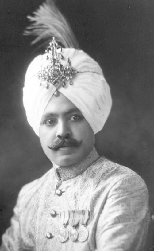 The Hon Raja Charanjit Singh. b. 1883, son of Kanwar Suchet Singh and cousin of Major-General H.H. Farzand-i-Dilband Rasikh-al-Iqtidad-i-Daulat-i-Inglishia, Raja-i-Rajagan, Maharaja Sir Jagatjit Singh, Bahadur, Maharaja of Kapurthala, GCSI, GCIE, GBE. Educ. Jullunder and Govt. Colls., Lahore. Mbr. of the Council of State 1903 and 1923-1932. Granted the personal title of ‘Raja’ 1932. Rcvd. Durbar Silver Medals 1903 and 1911, Coronation Medals 1911 and 1937, and Silver Jubilee Medal 1935. He d. 1970, having had issue four sons.